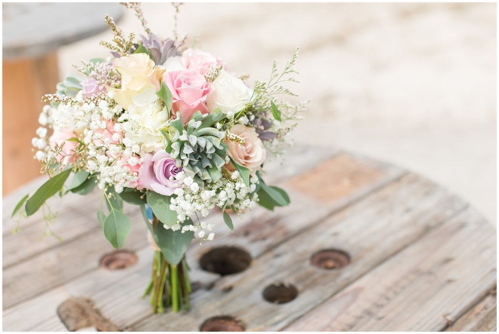 Gorgeous Blush and Lilac Bridal Bouquet with Succulents | Wedding in Spencer, Iowa shot by Jessica Brees Photography