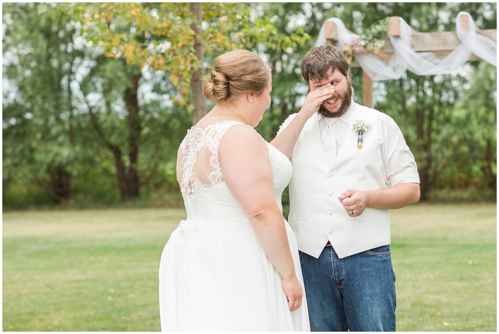 Bride and Groom First Look Near Wedding Altar | Wedding in Spencer, Iowa shot by Jessica Brees Photography