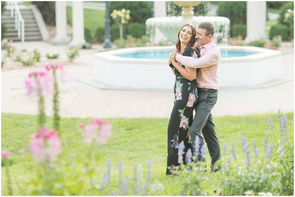 Romantic Engagement Photos in Flower Gardens| Engagement Portraits in Sioux City, Iowa shot by Jessica Brees Photography