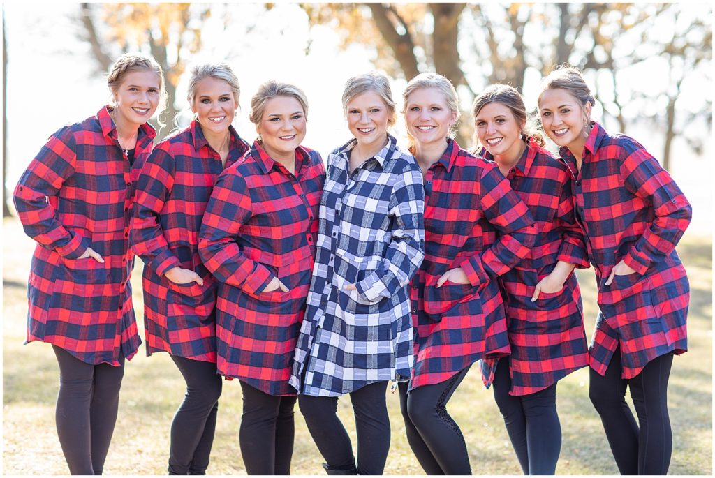 Bridesmaids in matching flannels shot by Jessica Brees, Sioux City Iowa engagement and wedding photographer