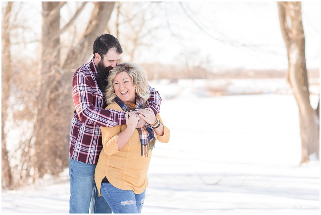 Ice Fishing Engagement Photos in LeMars, Iowa shot by Jessica Brees Photography & Videography