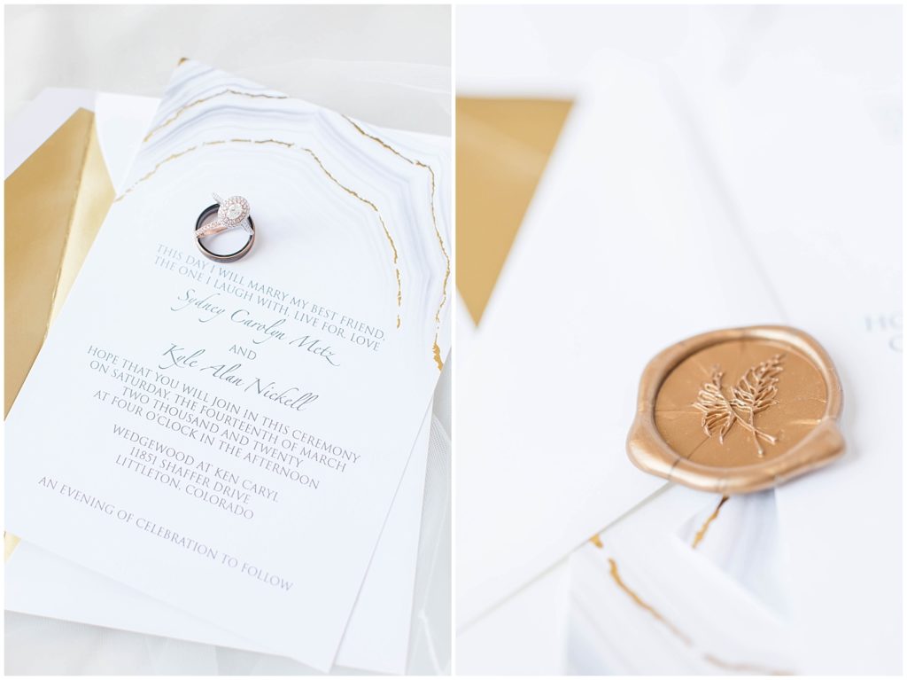 White and gold wedding invitation suite and ring set shot by Jessica Brees, Littleton Wedding Photographer and Videographer