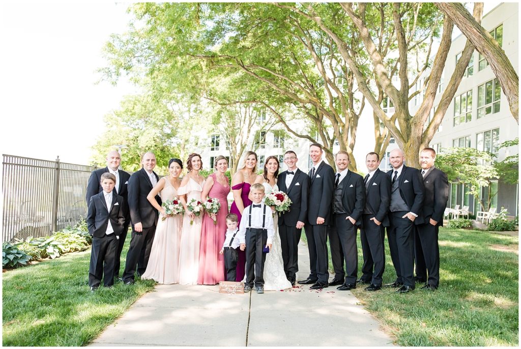 Bridal Party in Blush Dresses and Black Tuxedos | Marriott Riverfront Wedding in South Sioux City, Nebraska shot by Jessica Brees Photo & Video