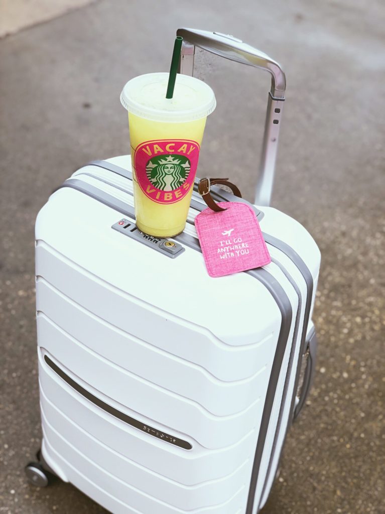 White suitcase with starbucks cup | Jessica Brees Photography