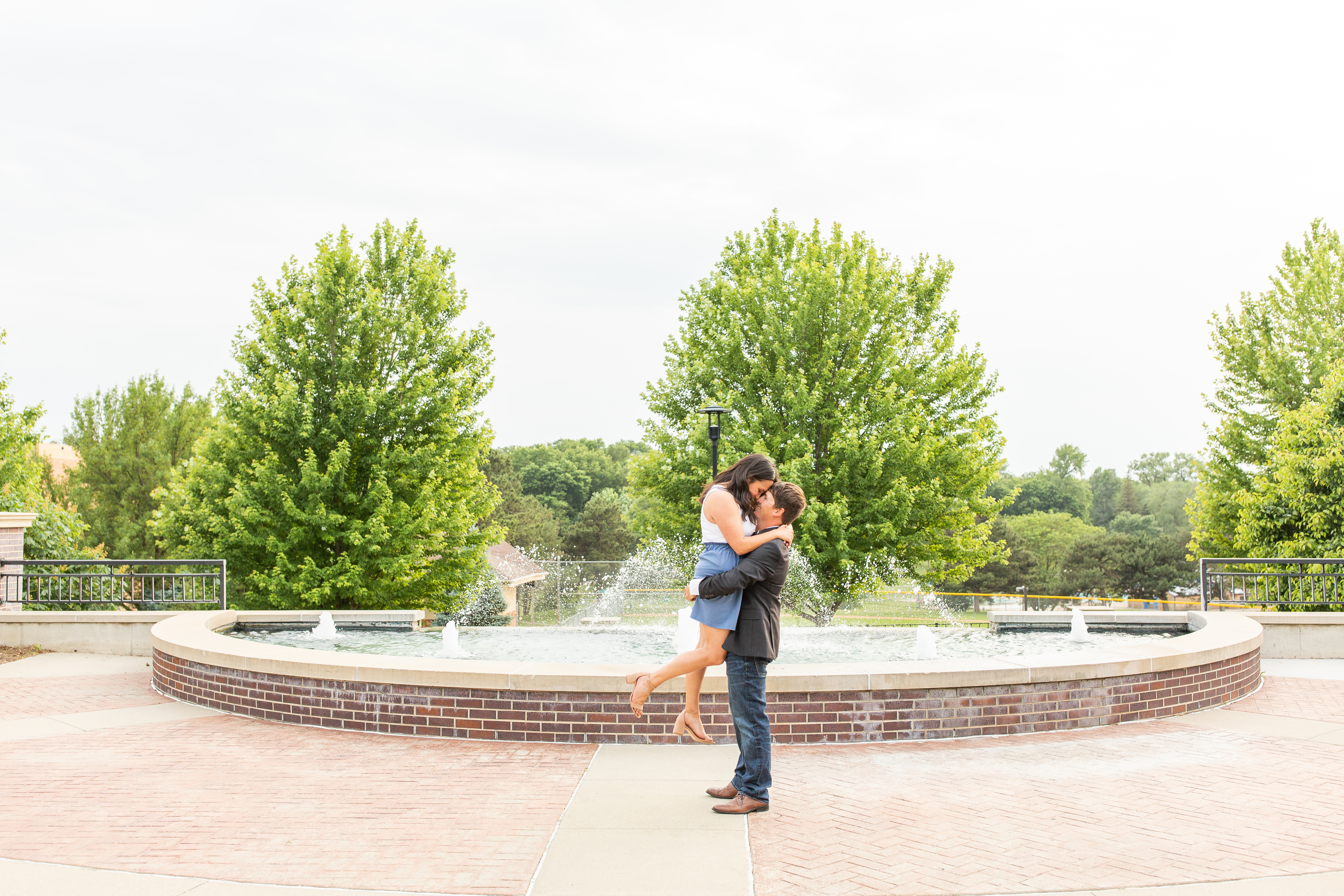 Romantic Engagement Photos on University Campus | Engagement Portraits in Sioux City, Iowa shot by Jessica Brees Photography