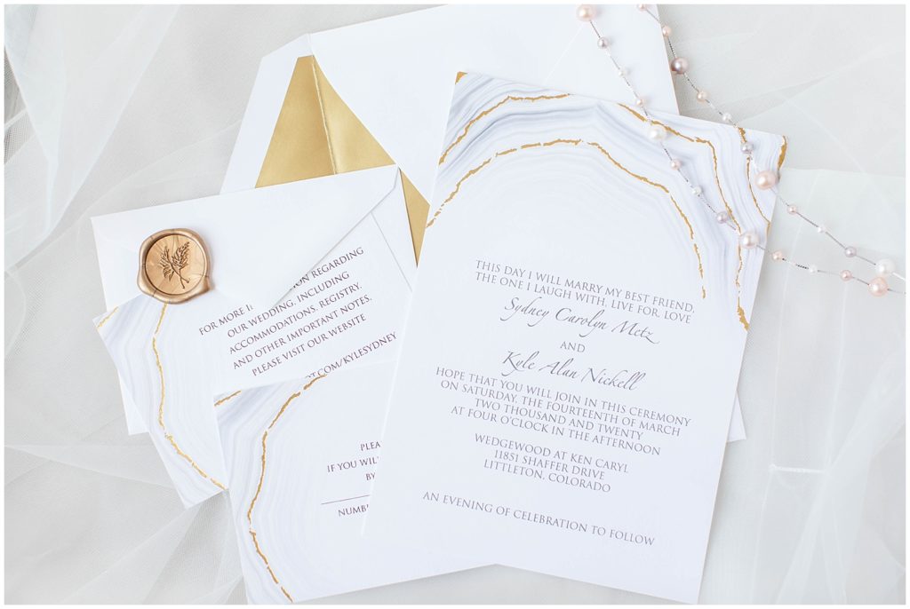 White and gold wedding invitation suite shot by Jessica Brees, Littleton Wedding Photographer and Videographer